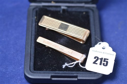 Lot 215 - Two tie clips.