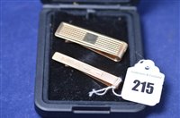 Lot 215 - Two tie clips.