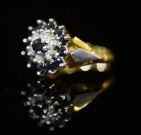 Lot 752 - Sapphire and diamond ring