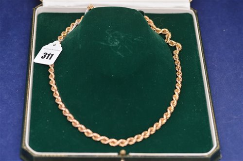 Lot 311 - A 9ct. yellow gold rope chain necklace.
