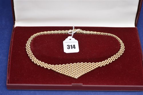 Lot 314 - A 9ct. yellow gold necklace.