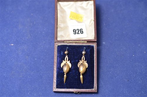 Lot 926 - A pair of Victorian hollow cast gold earrings