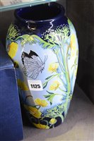 Lot 1125 - A Moorcroft "Butterfield" pattern vase.