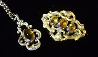 Lot 719 - Citrine pendant and brooch