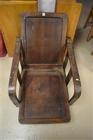 Lot 1249 - A 1930's Art Deco reclining oak armchair with...