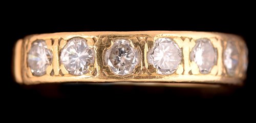 Lot 737 - Seven stone diamond ring