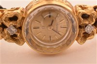 Lot 699 - An Omega 18k cocktail watch.