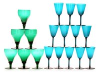 Lot 187 - A set of twelve 19th Century bottle green wine glasses