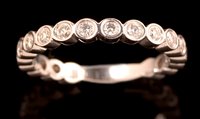 Lot 720 - Diamond eternity ring