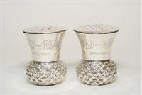 Lot 642 - Pair of scottish silver thistle pepperettes
