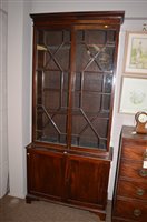 Lot 801 - A late 19th century mahogany bookcase with...