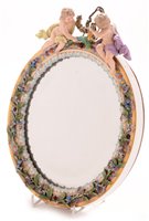 Lot 107 - 19th Century porcelain Meissen oval mirror.