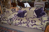Lot 752 - A modern upholstered two seater sofa with a matching armchair.