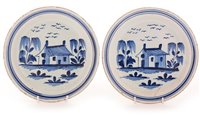 Lot 104 - A pair of late 18th Century tin glazed earthenware "Pancake" plates