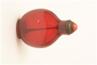 Lot 57 - A 19th Century Chinese amber glass snuff bottle