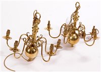 Lot 459 - A pair of reproduction Dutch style brass chandeliers in 17th style