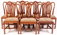 Lot 1002 - A set of seven George III style mahogany dining chairs.