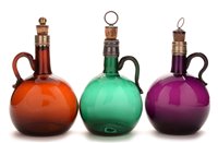Lot 194 - Three coloured glass decanters