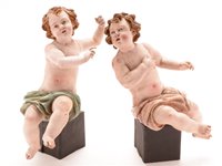 Lot 442 - A pair of cherubs