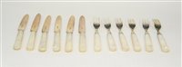 Lot 562 - Mother of pearl and silver fruit knives and forks