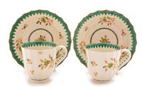 Lot 109 - A pair of 18th Century Worcester coffee cups and saucers