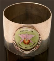 Lot 655A - Napkin ring Orchid Society