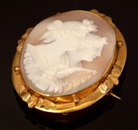 Lot 702 - A Victorian carved shell cameo brooch.