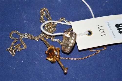 Lot 118 - A dress ring; a bar brooch; and a chain.
