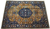 Lot 873 - A Tabriz rug