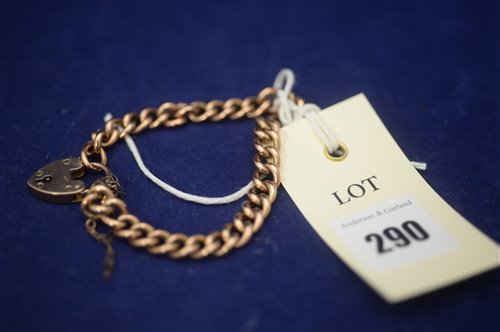 Lot 290 - 9ct yellow gold curb link bracelet with locket clasp