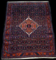 Lot 574 - A Senneh rug