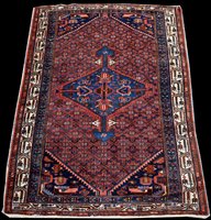 Lot 567 - A Malayer rug.