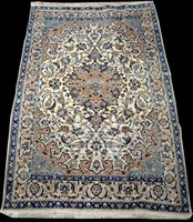 Lot 588 - A Nain rug