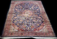 Lot 890 - A Kashan carpet