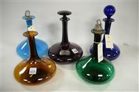 Lot 423 - Five Georgian coloured glass decanters.
