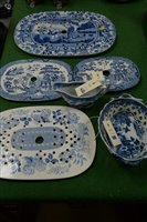Lot 436 - Four 19th Century blue and white decorated drainers