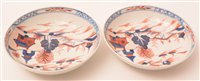 Lot 100 - 18th Century pair of Lowestoft Redgrave dolls house pattern tea bowls and saucers