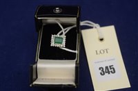 Lot 345 - An emerald and diamond dress ring