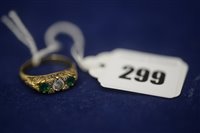 Lot 299 - Emerald and diamond ring