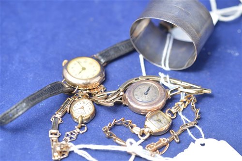 Lot 253 - Four watches and napkin ring
