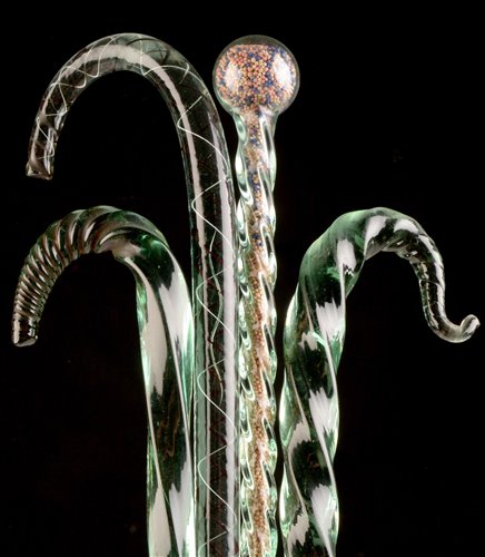 Lot 133 - Four glass walking canes.