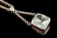 Lot 553 - Aquamarine and diamond pendant