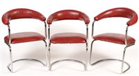 Lot 1131 - Three mid 20th Century red vinyl and steel chairs possibly by Pieff