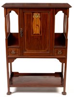 Lot 1066 - Attributed to Shapland & Petter: an Art Nouveau inlaid mahogany music cabinet.