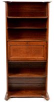 Lot 1135 - Manner of Shapland & Petter: an Arts & Crafts style bureau bookcase.