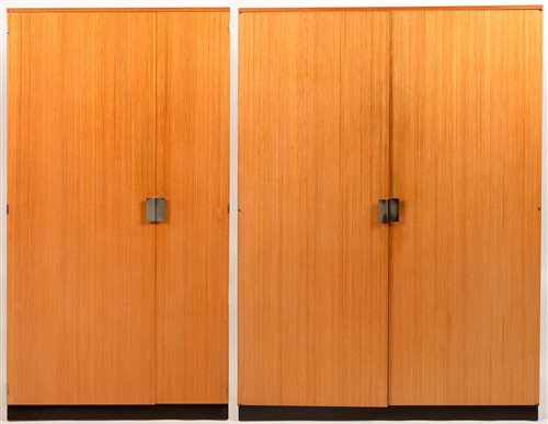 Lot 1076 - John & Sylvia Reid for Stag: two fine line teak wardrobes; and a headboard.