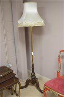 Lot 568 - Brass and mahogany standard lamp