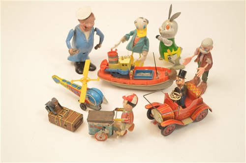 Lot 1100 - Tinplate and other clockwork mechanical toys