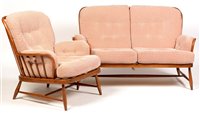 Lot 1092 - Ercol: a beech 'Jubilee' two-seater settee and matching easy chair