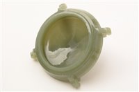 Lot 25 - A greem nephrite vessel and cover.